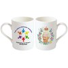 two white mugs with colorful designs