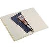 a pen on a white cover