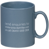 a grey mug with white text