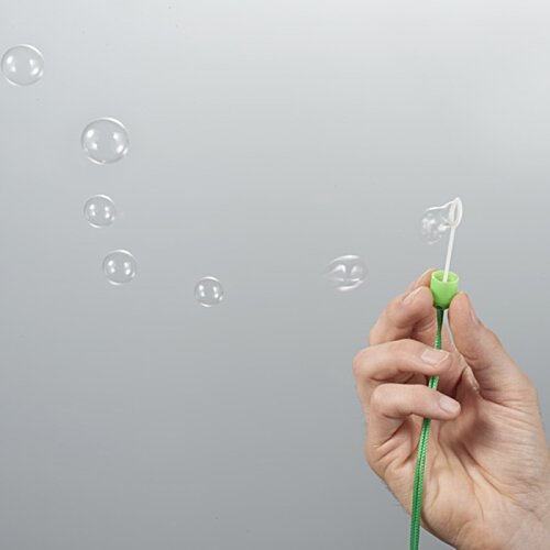 Additional Image 1 - a hand holding a green object