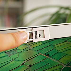 Additional Image 1 - a finger pointing at a white object