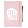 a pink notebook with white text