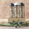 Additional Thumbnail Image 2 - a group of bottles on a wooden stand