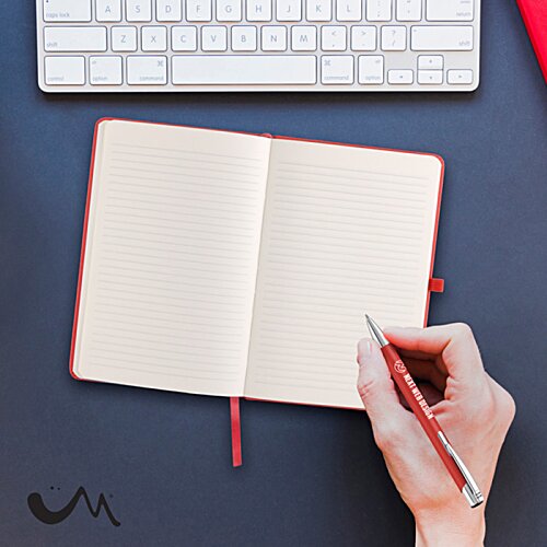 Additional Image 4 - a hand holding a pen and writing on a notebook