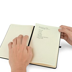 Additional Image 3 - a person holding a pencil in a notebook