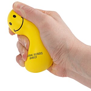 Additional Image 2 - a hand holding a yellow squishy toy