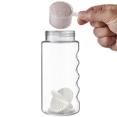 Additional Image 4 - a hand holding a spoon over a bottle