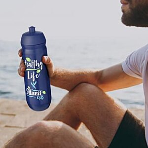 Additional Image 2 - a person holding a bottle