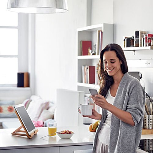 Additional Image 3 - a woman standing in a kitchen