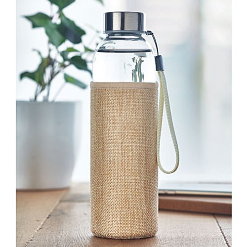 Additional Image 3 - a bottle of liquid on a table