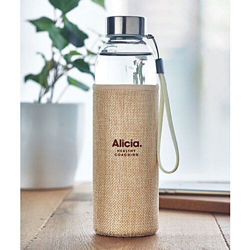 Additional Image 4 - a bottle of liquid on a table
