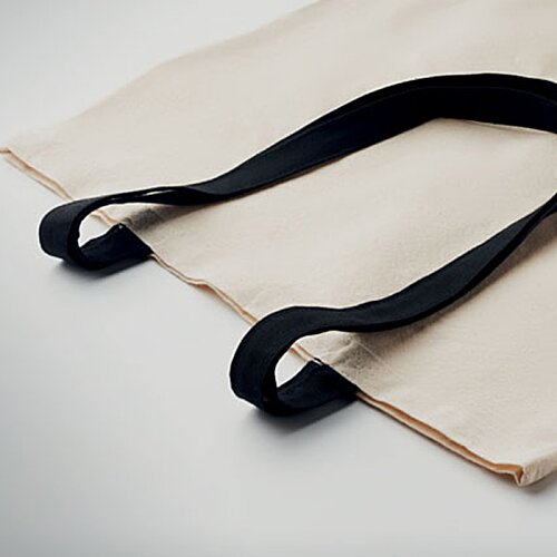 Additional Image 1 - a black strap on a white bag