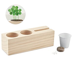 Additional Image 1 - a wooden block with holes and a cup