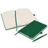 a green notebook and pen