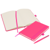 a pink notebook and pen