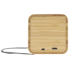 a square wooden object with a cord