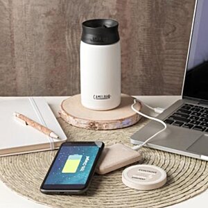 Additional Image 3 - a cell phone and a white bottle on a table