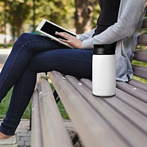 Additional Image 4 - a woman sitting on a bench