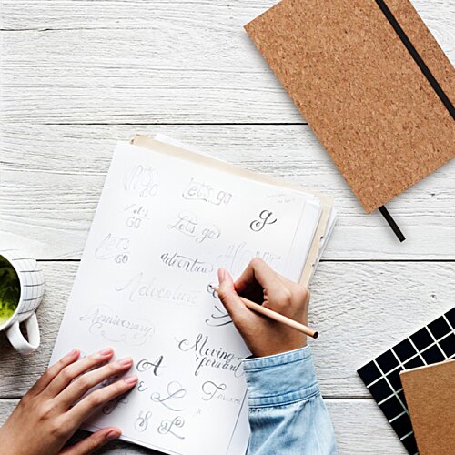 Additional Image 5 - a person writing on a piece of paper