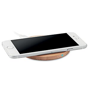 Additional Image 4 - a white cell phone on a wireless charger