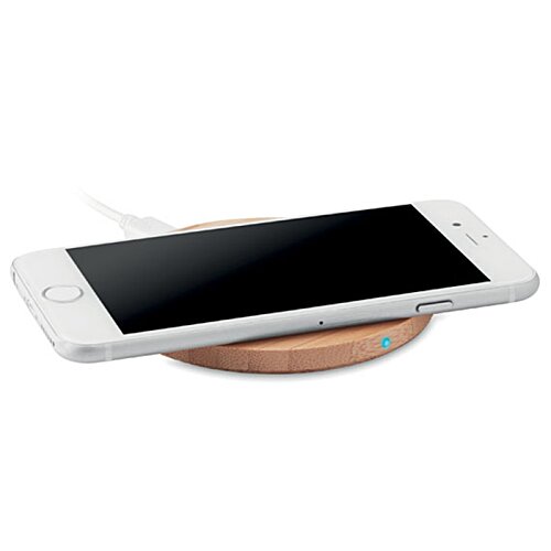 Additional Image 4 - a white cell phone on a wireless charger