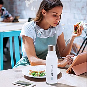 Additional Image 2 - a woman sitting at a table