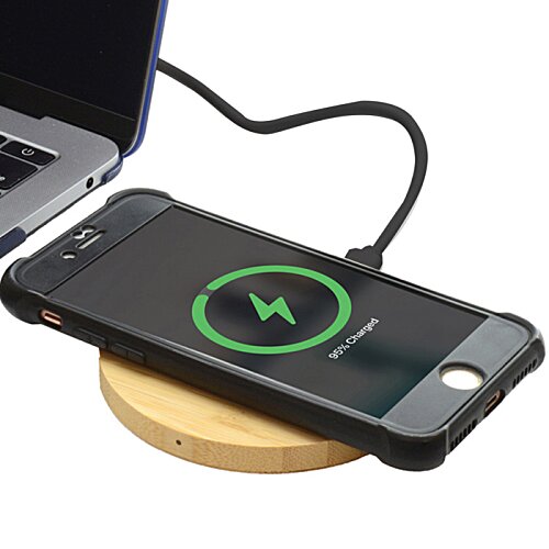 Additional Image 2 - a phone charging on a wireless charger