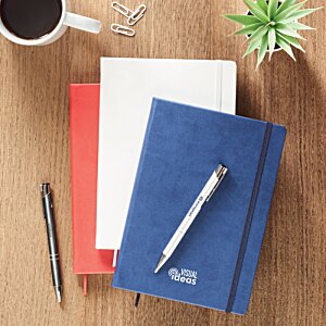 Additional Image 4 - a stack of books and a pen on a table