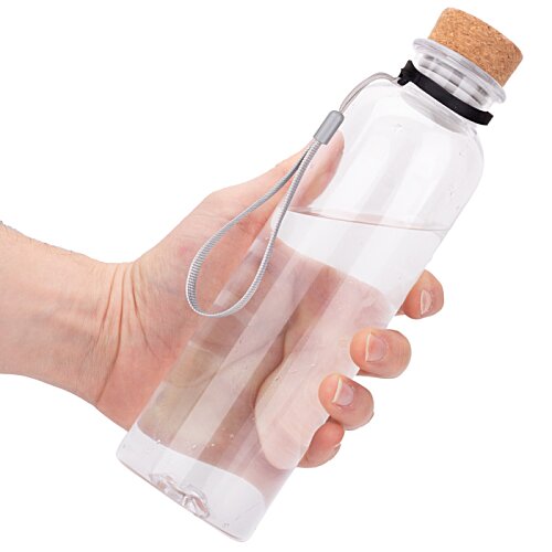 Additional Image 1 - a hand holding a bottle
