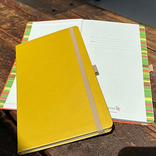 Additional Image 9 - a yellow notebook on a table