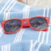Additional Thumbnail Image 2 - a red sunglasses on a blue towel