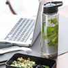 Additional Image 2 - a bottle of water next to a laptop