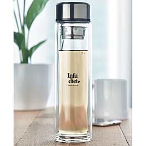 Additional Image 4 - a glass container with a brown liquid in it