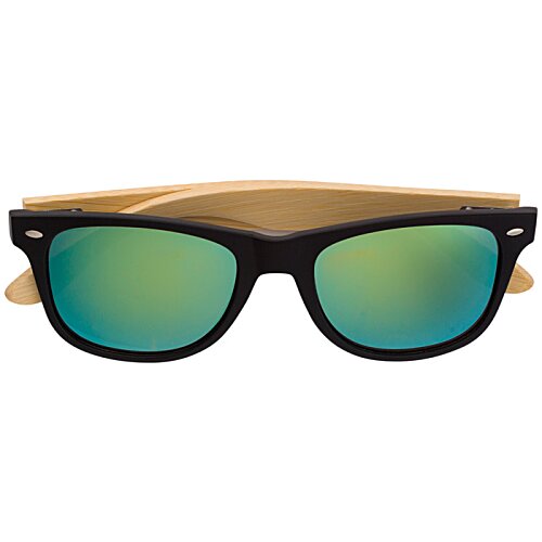 Additional Image 1 - a pair of sunglasses with green lenses
