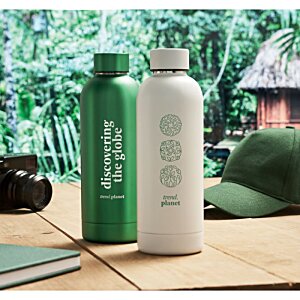 Additional Image 4 - a white and green bottles on a table