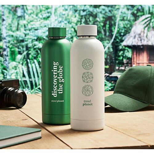 Additional Image 4 - a white and green bottles on a table