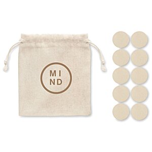 Additional Image 1 - a small white pouch with string and a few small white circles