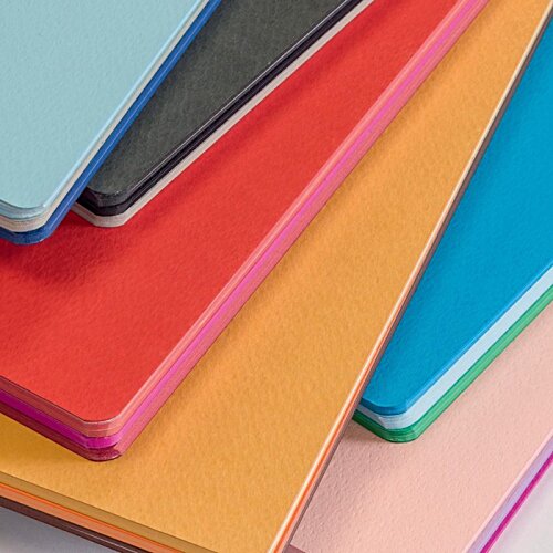 Additional Image 2 - a close up of a stack of colorful notebooks