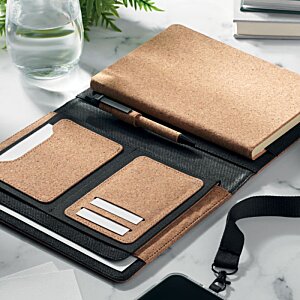 Additional Image 3 - a brown folder with a strap and a phone on a table
