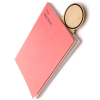 a pink envelope with a wooden spoon