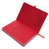 a red notebook with a red cover