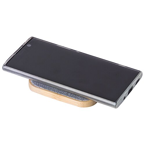 Additional Image 1 - a black rectangular device with a wooden base