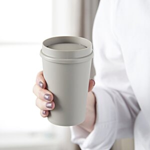 Additional Image 3 - a person holding a cup