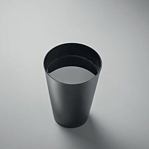 Additional Image 2 - a black cup with a white liquid in it