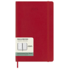 a red notebook with a white label