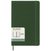 a green notebook with a white button