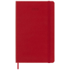 a red notebook with a pen