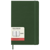 a green notebook with a white label