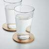 a pair of glasses with liquid on coasters