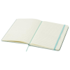 a white notebook with blue lines